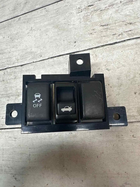 Infiniti Q40 traction contro & trunkl release switch 2015 OEM assy L13242AA600