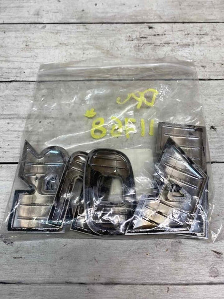 2015 DODGE RAM 1500 PICKUP FRONT DOOR EMBLEM RAM LETTERS OEM