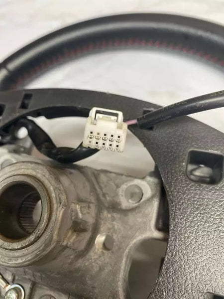 18 19 20 21 22 23 MITSUBISHI OUTLANDER SPORT VOLANTE DE CUERO CON COSTURA ROJA OEM 4400A706XB