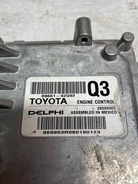 Toyota Corolla engine control module 17 19 896610ZQ92 dented and broken plug OEM