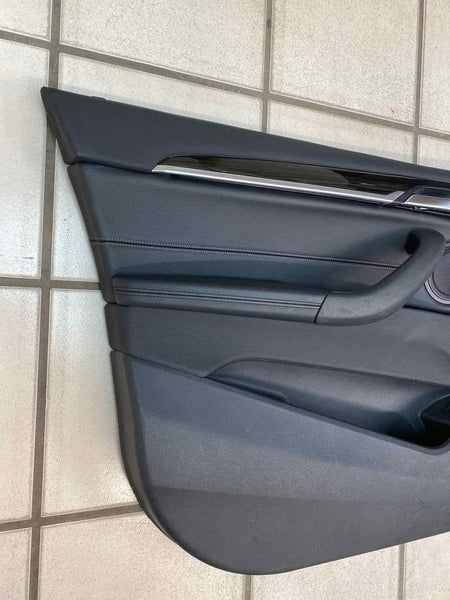 16 21 BMW X1 FRONT LEFT INNER DOOR TRIM PANEL OEM LEATHER BLACK 51417438069