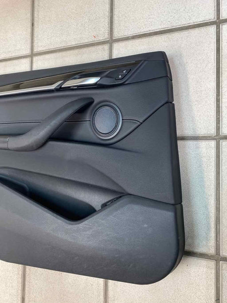 16 21 BMW X1 FRONT LEFT INNER DOOR TRIM PANEL OEM LEATHER BLACK 51417438069