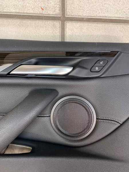 16 21 BMW X1 FRONT LEFT INNER DOOR TRIM PANEL OEM LEATHER BLACK 51417438069
